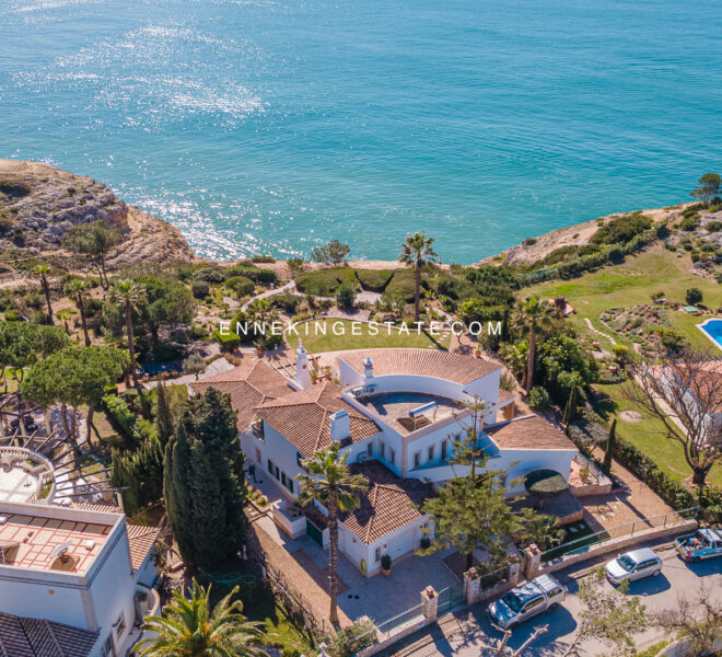 Ocean front 4-bedroom clifftop villa Carvoeiro with panoramic sea views and private pools